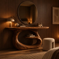 Oval top makeup vanity on a looping pedestal base with a small inner shelf in an evening bedroom with walnut wall paneling
