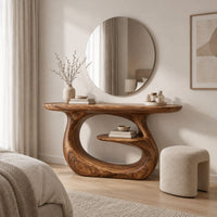 Oval top makeup vanity on a looping pedestal base with a small inner shelf in a Scandinavian bedroom with white walls