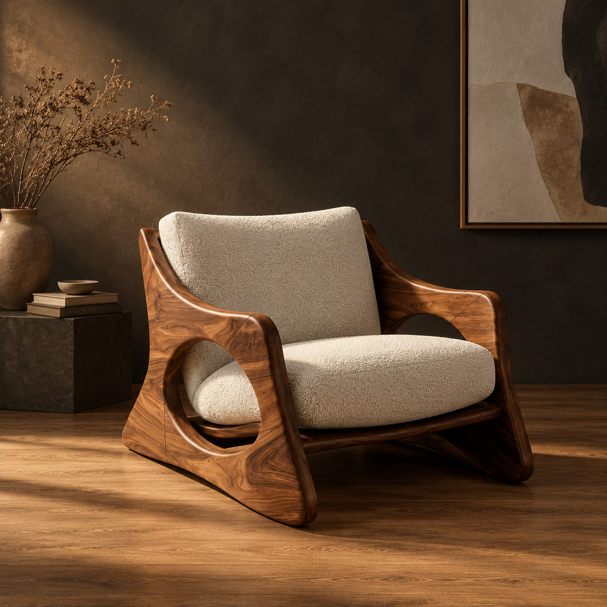 Sculptural lounge chair with oval side cutouts and a cushioned seat in a dark studio against a charcoal plaster wall