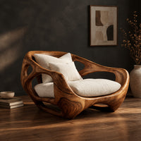 Sculpted lounge chair with an open hollowed wood frame and low base, three-quarter view showing the grain