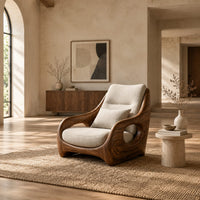 Sculpted lounge chair with oval side cutouts and a cushioned seat in a bright open plan living room