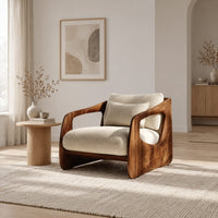 Chair with thick sculpted wooden side panels, oval cutouts and a cushioned seat in a Scandinavian living room with white walls