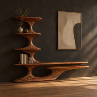 Sculpted tv stand with a stacked shelf tower and a long low ledge, three-quarter view showing the grain