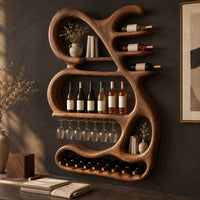 Corner detail of sculpted wine rack with a looping frame, glass rail and bottle arms beside wood, brass and linen samples