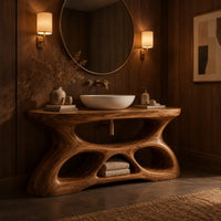 Vanity with a flowing oval top and a sculpted base pierced by smooth openings in an evening bathroom with walnut wall paneling