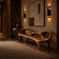 Wooden bench with a low backrest cut with two oval openings on tapered legs in an evening entryway with walnut wall paneling