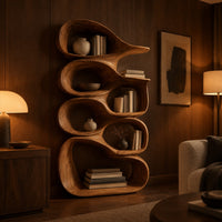 Tall bookshelf made of stacked open wooden cells with a pointed top in an evening living room with walnut wall paneling