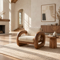 Lounge chair with thick closed loop wooden side frames in a bright open plan living room