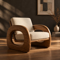 Lounge chair with thick open loop arms and sled base, three-quarter view showing the grain