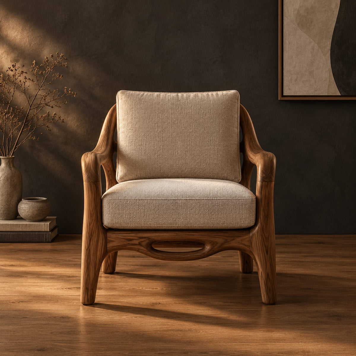 Lounge chair with sweeping arms and an oval cutout seat rail in a dark studio against a charcoal plaster wall