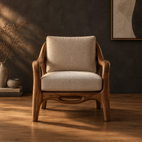 Lounge chair with sweeping arms and an oval cutout seat rail in a dark studio against a charcoal plaster wall