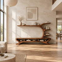 Low tv stand with a tree trunk rising into branch shelves in a bright open plan living room