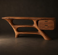Sculptural vanity with slanted legs, two open bays and a drawer box, three-quarter view showing the grain