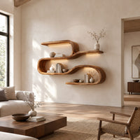 Wavy shelf unit with three flat levels joined by smooth looped bends in a bright open plan living room
