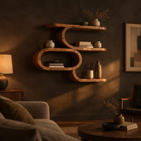 Serpentine wall shelf with an open oval loop in the middle in a dark living room at golden hour