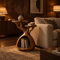 Tree form wood side table with three tops and a hollow base in an evening living room with walnut wall paneling