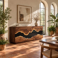 Sideboard with three tall doors and a dark wavy band across the front in a bright dining room with arched windows and plants