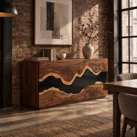 Sideboard with three tall doors and a dark wavy band across the front in an industrial loft dining room with exposed brick