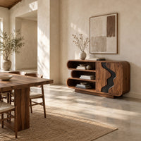 Sideboard with three stacked open shelves and a black wave inlay door in a bright open plan dining room