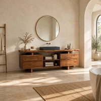 Slab top bathroom vanity with two drawer stacks and an open towel shelf in a bright open plan bathroom