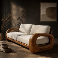 Sofa with thick open loop wooden arms and two seat cushions, three-quarter view showing the grain