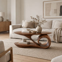 Oval coffee table with a top that sweeps into one large spiral curl in a Scandinavian living room with white walls
