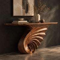 Corner detail of console table on a single spiral scroll base with fanned carved ridges beside wood, brass and linen samples