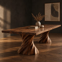 Long dining table on two spiral twisted pedestals with a thick flat top, three-quarter view showing the grain