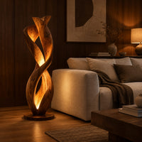 Twisted floor lamp with spiral wood ribbons and a warm inner glow in an evening living room with walnut wall paneling