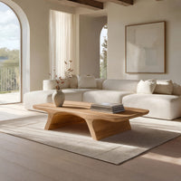 Pale splayed leg coffee table in a bright modern living room