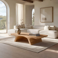 Pale splayed leg coffee table in an open plan space in daylight