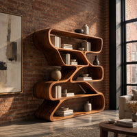 Bookshelf of staggered looping open compartments with soft pill shaped ends in an industrial loft living room with exposed brick