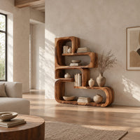 Stepped bookshelf of chunky open cubbies with offset shelves in a bright open plan living room