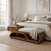 Wood bench with a small drawer and an open wave shaped base in a Scandinavian bedroom with white walls