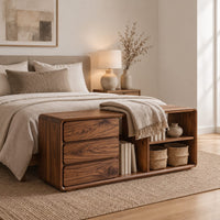 Low storage bench with three stacked drawers and open shelf bays in a Scandinavian bedroom with white walls
