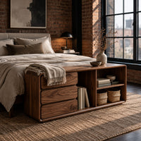 Low storage bench with three stacked drawers and open shelf bays in an industrial loft bedroom with exposed brick