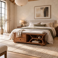 Storage bench with two drawers and a branch shaped open shelf in a bright open plan bedroom