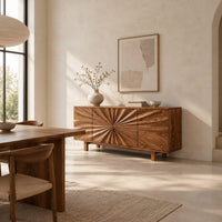 Sideboard with a sunburst carved center panel and short legs in a bright open plan dining room