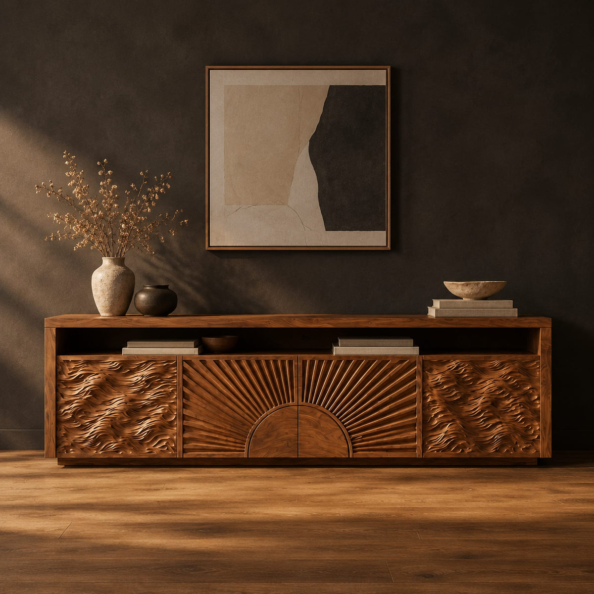 Tv stand with a carved sunburst center and wave relief side panels in a dark studio against a charcoal plaster wall