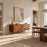 Wood sideboard with a sunburst grain pattern and tapered legs in a bright open plan dining room