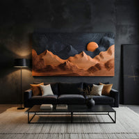 Sunrise mountain wall sculpture with a dark carved sky on a dark charcoal plaster wall
