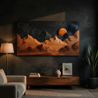 Sunrise mountain wall sculpture with a dark carved sky above a low console in an evening living room