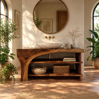 Bathroom vanity with a thick wood top, a sweeping arch support and open shelves in a bright bathroom with arched windows and plants