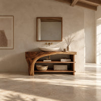 Bathroom vanity with a thick wood top, a sweeping arch support and open shelves in a bright open plan bathroom