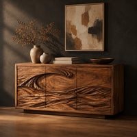 Three door sideboard carved with one long curling wave, three-quarter view showing the grain