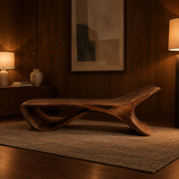 Low sweeping bench with an open loop underside and a raised end in an evening entryway with walnut wall paneling