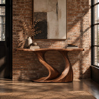 Console table with a slim top on one sweeping sculpted pedestal in an industrial loft entryway with exposed brick