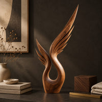 Corner detail of wood sculpture of a swept wing with carved feather grooves and an open loop beside wood, brass and linen samples