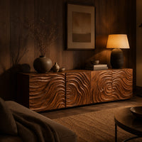 Low wooden tv stand with swirl carved front panels in an evening living room with walnut wall paneling
