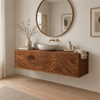 Wall mounted bathroom vanity cabinet with three swirl carved front panels in a Scandinavian bathroom with white walls